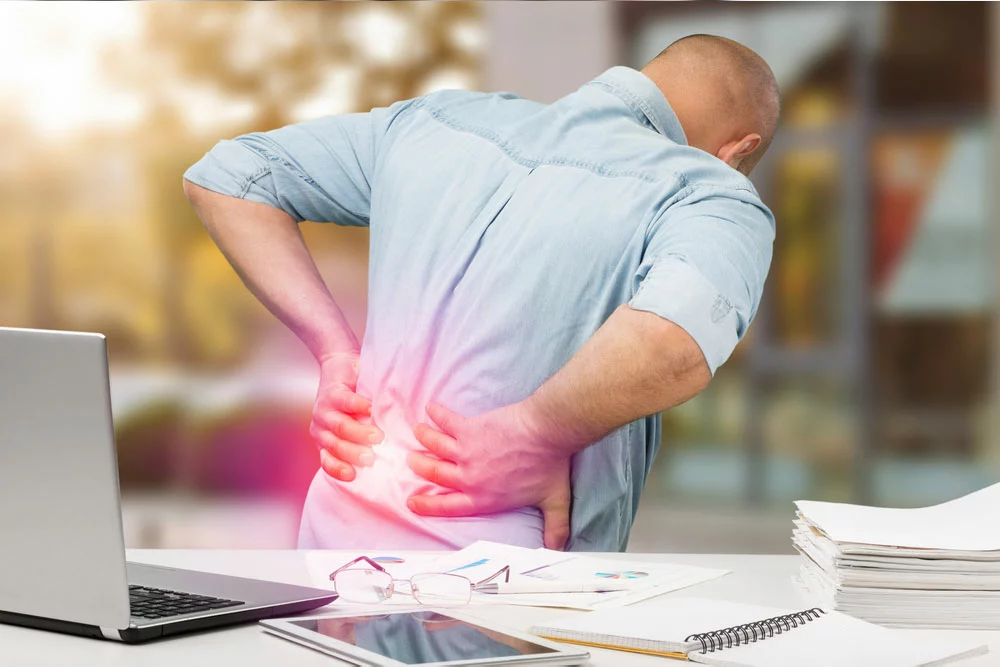 Man holding his back in pain