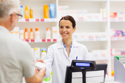 pharmacist helping customer