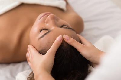 woman receiving clinical facial