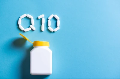 CoQ10 spelled out with supplement tablets